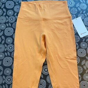 Lululemon Align HR Crop 21” Cantaloupe Leggings. Size 8, NWT.